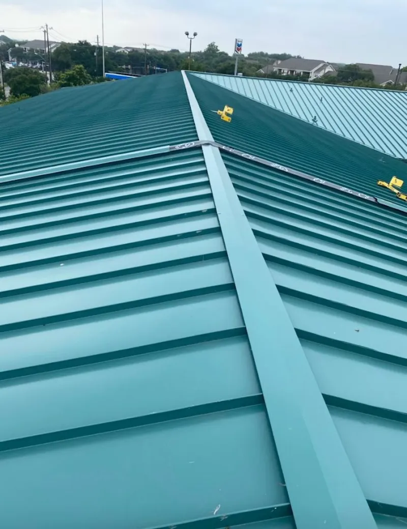 Green commercial metal roof ridge and valley for Metal Roof Repair in Seymour